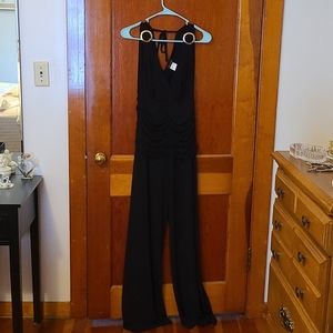 Brand new never warn jumpsuit black size 6